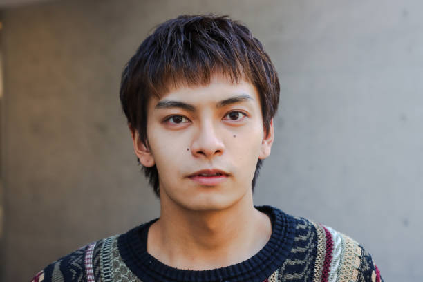 istock Young handsome man standing at the city 2165530504