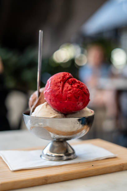 icecream is in cup on the table vertical food still