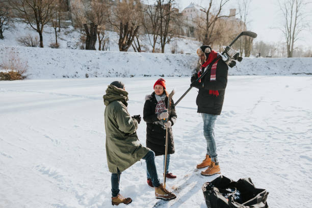 istock Friends drinking tea and having a chat outdoors at winter 2165535811