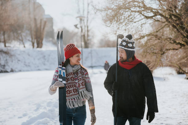 istock Friends going skiing together on a sunny winter day 2165535823