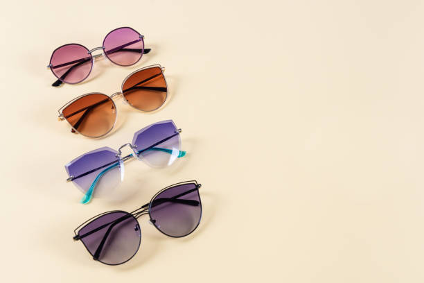 istock Different sunglasses on yellow background. Frame. Summer banner. Copy space. 2165536419