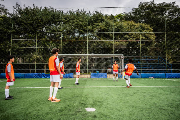 istock Soccer players training on soccer field 2165538226