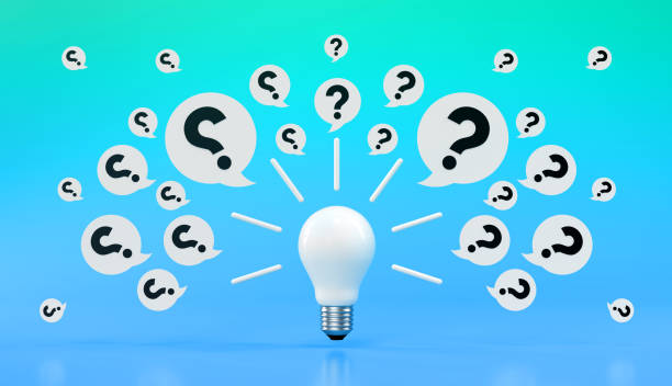 istock Light bulb and questions , blue background. 2165539269