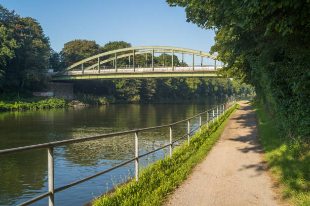 istock older steel road bridge over a canal 2165539782