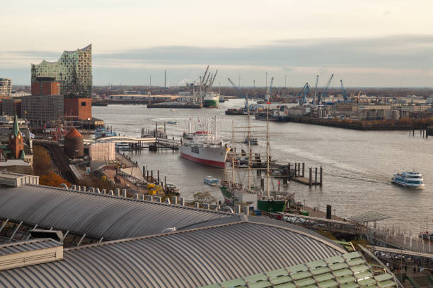 Hamburg, Germany - November 26, 2018: Hamburg port aerial view with moored ships and the Elbphilharmonie on the background