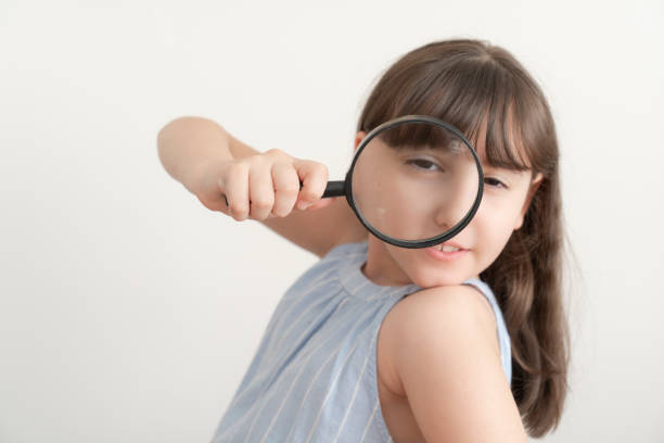 istock Girl with magnifier 2165540510