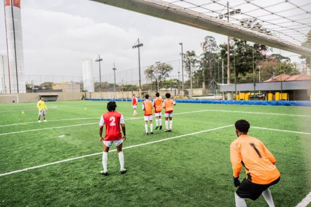 istock Soccer players training on soccer field 2165540851