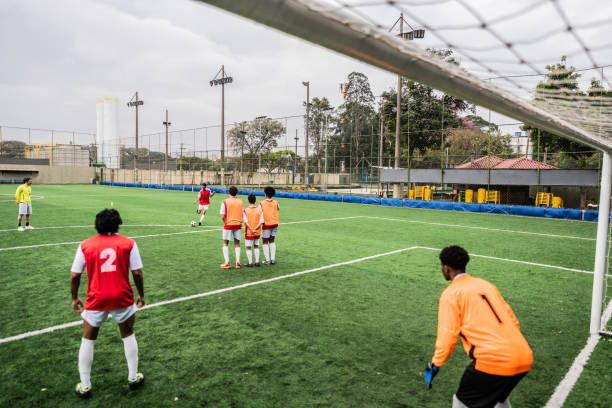 Soccer players training on soccer field