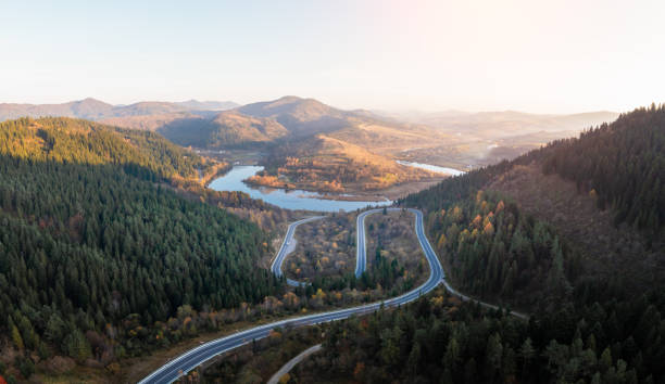 istock Autumn mountains panorama with mountain road serpentine 2165540992
