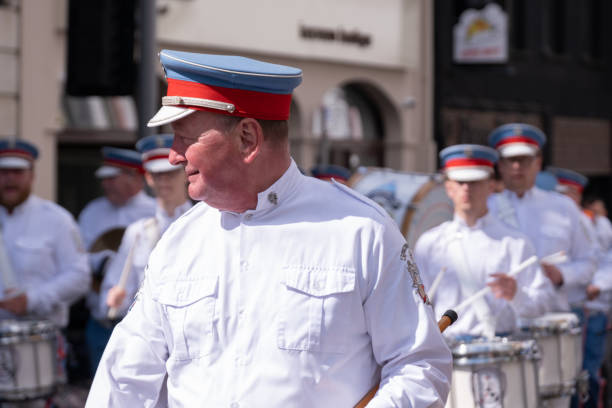 Ballymena, UK - June 25th 2022: Ballykeel Loyal Sons of Ulster Flute Band, on Broughshane Street during Orange Order mini-Twelfth parade.