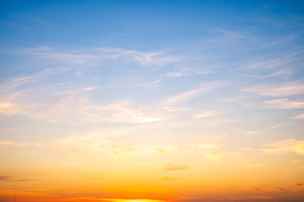 istock Beautiful , luxury soft gradient orange gold clouds and sunlight on the blue sky perfect for the background, take in everning,Twilight, Large size, high definition landscape photo 2165541282