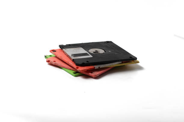 istock pile of dirty diskettes, floppy disk, isolated on white background 2165544283