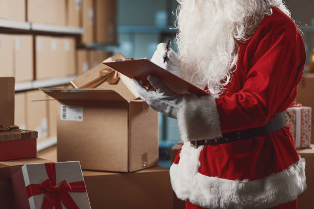 istock Santa Claus working at the warehouse 2165544985