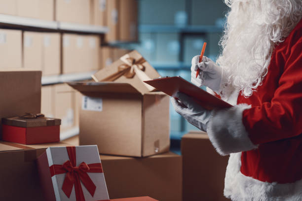 istock Santa Claus working at the warehouse 2165544996