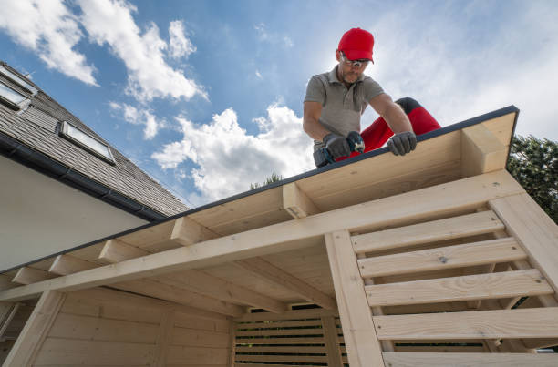istock Man Installing Roof On Wooden Structure 2165546269