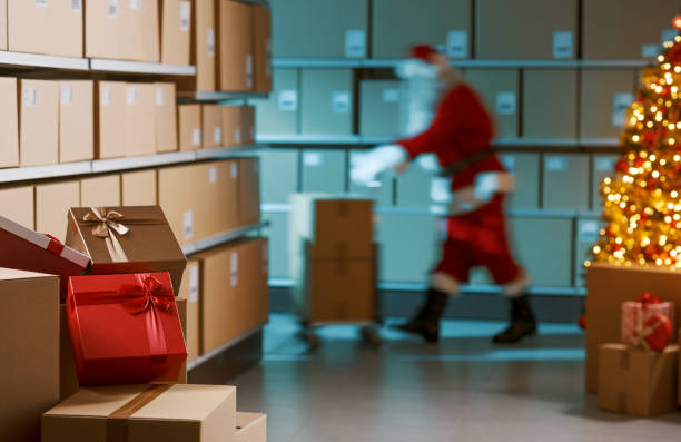 istock Santa Claus working in the warehouse 2165546364