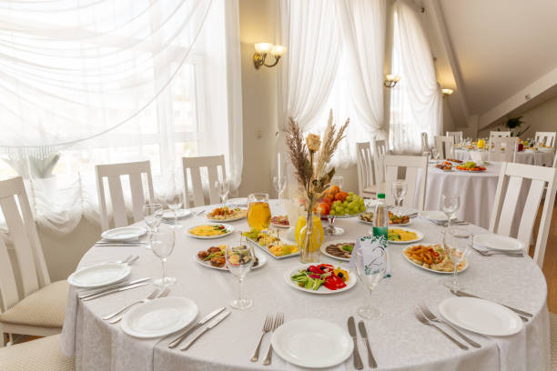 istock Wedding banquet in restaurant, covered round table for guests 2165546930