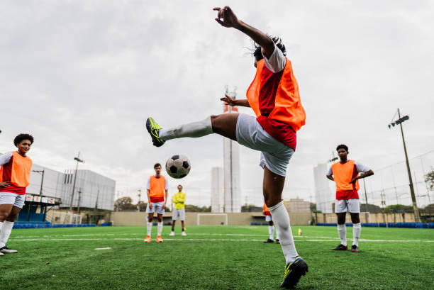 istock Soccer players training on soccer field 2165552072
