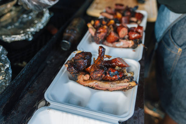 Chicken breast laying in the hot flames on barbecue
