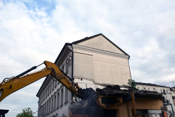 Residential construction progress with excavator. Excavator working for new housing estate construction