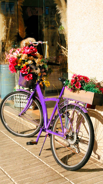 istock Bicycle leaning in the street, decorative purposes 2165555987