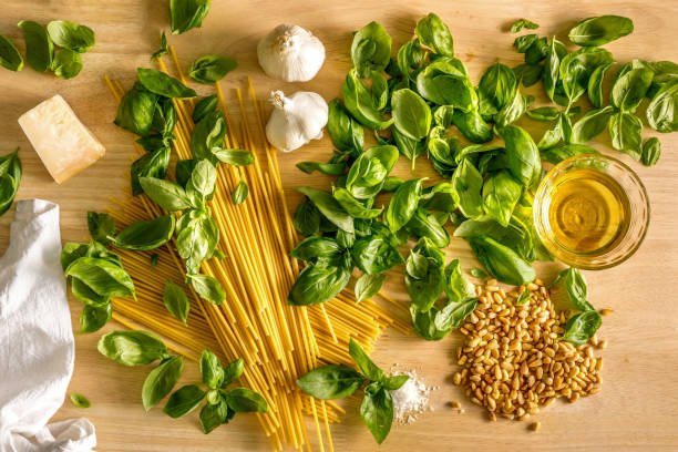 istock All ingredients for spaghetti pest, olive oil, basil, garlic and pasta 2165557466
