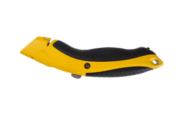 Segmented blade or snap-off blade utility knife isolated on white background. High quality photo