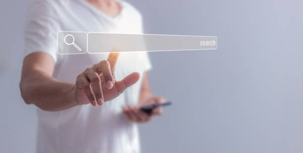 istock Young man hand touching search bar and using, holding, uses, smartphone mobile, Search job 2165561894