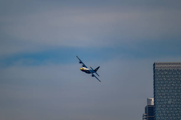 Seattle WA, USA - August 4, 2024:  A United States Marine Corps Blue Angels cargo plane flys over the city of Seattle during the 75th Anniversary Seafair Summer Festival exhibition.