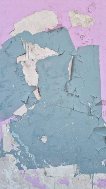 istock Peeling paint on an old wall. Grunge background for design 2165562688