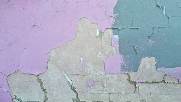 istock Peeling paint on an old wall. Grunge background for design 2165562889