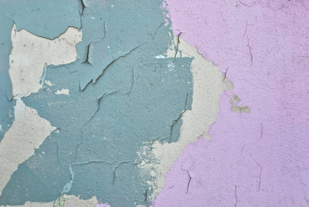 istock Peeling paint on an old wall. Grunge background for design 2165562892