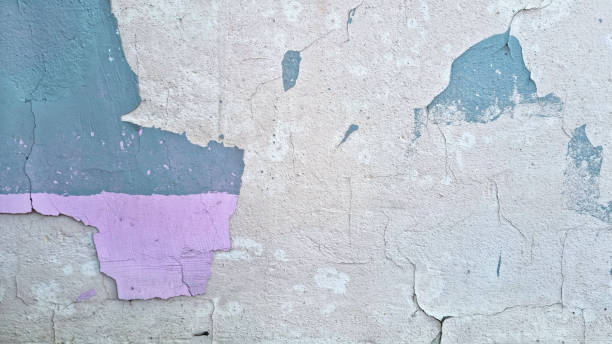 istock Peeling paint on an old wall. Grunge background for design 2165563176