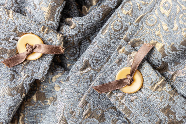 istock Textile luxury background velour, silk and buttons with bows 2165563236