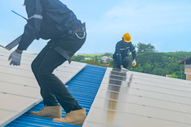 istock engineer man inspects construction of solar cell panel or photovoltaic cell by electronic device. Industrial Renewable energy of green power. factory worker working on tower roof. 2165569274