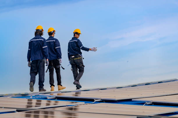 istock engineer man inspects construction of solar cell panel or photovoltaic cell by electronic device. Industrial Renewable energy of green power. factory worker working on tower roof. 2165569992