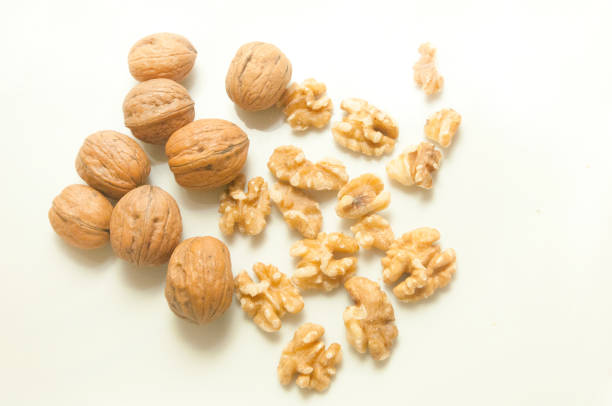 Walnuts closed and opend on white background