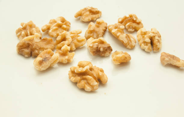 istock Litle group of unshelled walnuts 2165571462