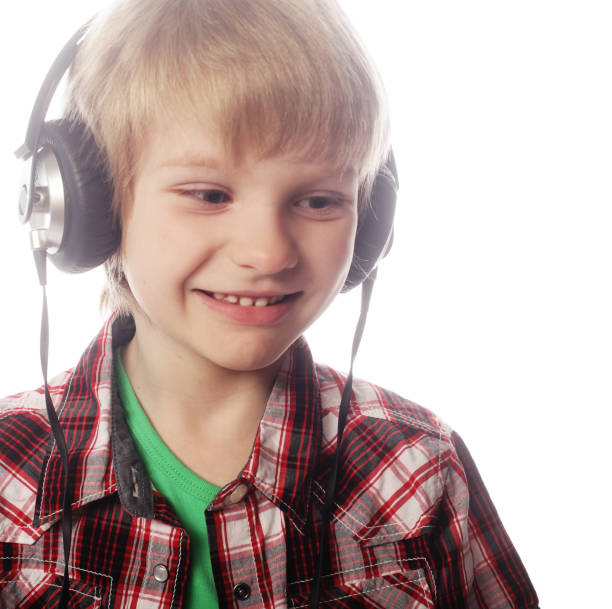 The young boy is enjoy the music