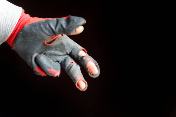istock A damaged glove is depicted in the image, showcasing its worn, d 2165586667