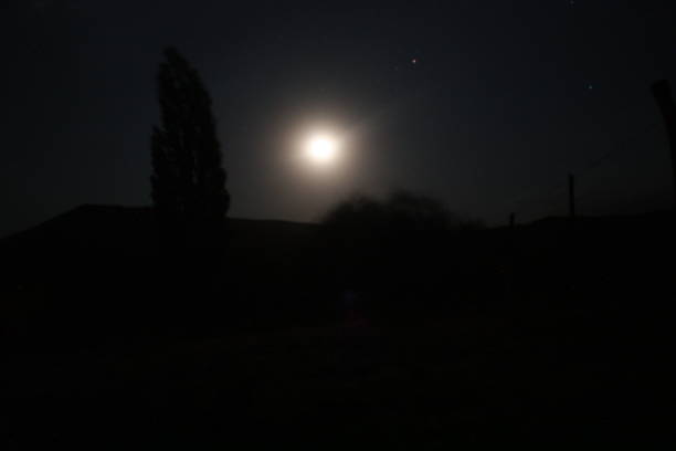 istock Patagonian night and full moon 2165590288