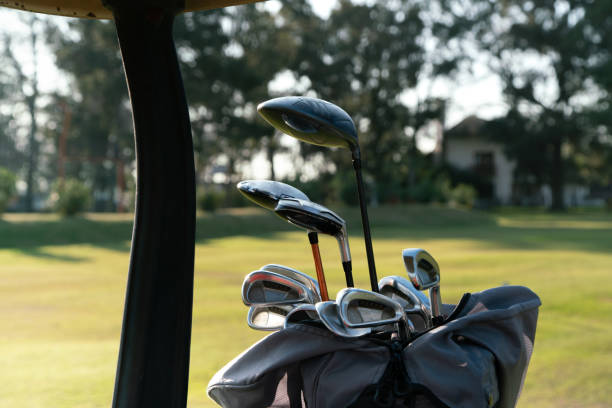 istock Golf Clubs in a Cart Bag, in a golf course. 2165596714
