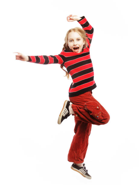 istock girl jumps on a white background 2165597163