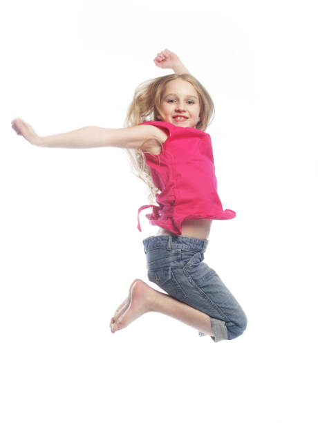istock girl jumps on a white background 2165598239