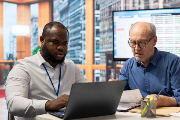 istock Old people receiving professional advice on retirement options 2165602611