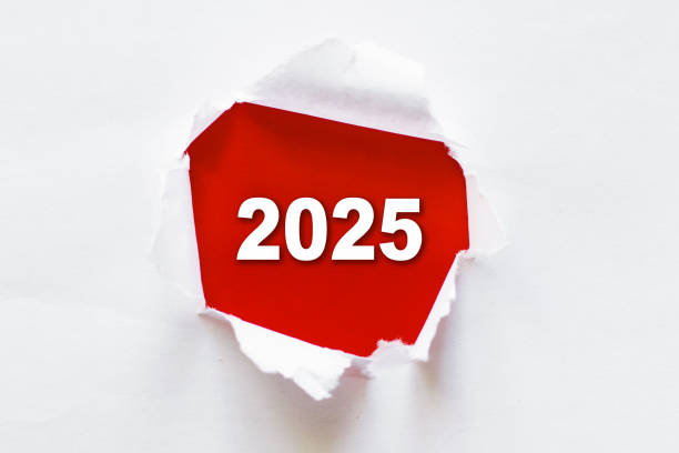 istock Creative Business Concept Revealed Through Torn Paper for New Year 2025 Celebration 2165611237