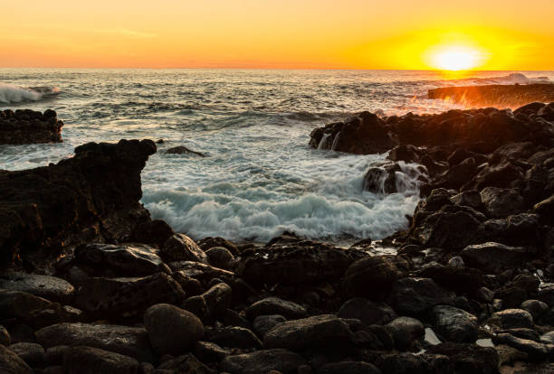 istock Sunset on Exposed Lava Reef at Kukuiula Landing Park, 2165615204