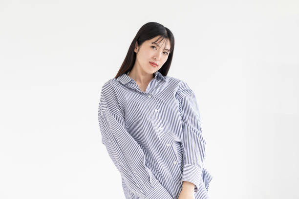 istock attractive asian woman relaxing 2165618654