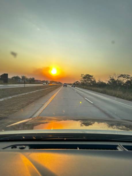 istock BEAUTIFUL HIGHWAY ROAD SCENE WITH SUNSET 2165621396
