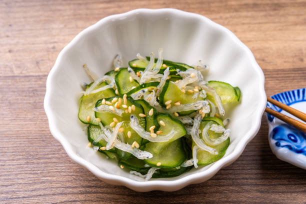 istock Cucumber and small sardines in vinegar 2165622252